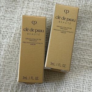 2 New Cle de Peau Beaute Precious Gold Vitality Serum Samples .1oz each